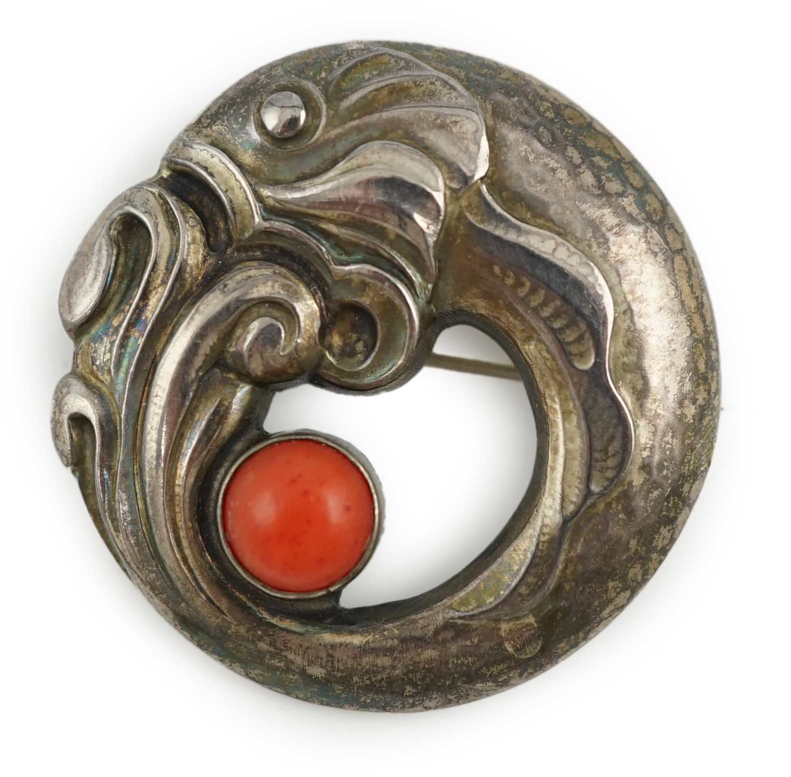 A Georg Jensen sterling silver and cabochon coral set fish brooch